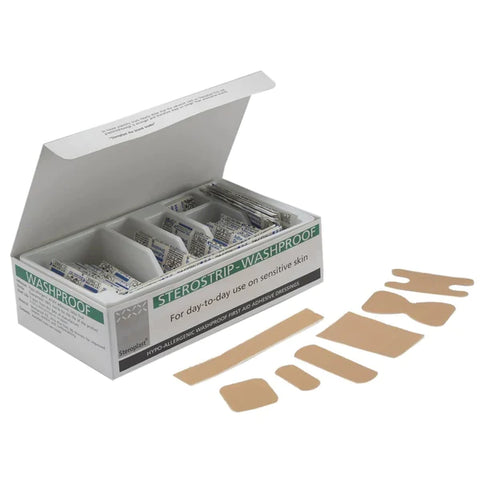 Adhesive Washproof Plasters, the box is open showing all the plasters in their individual packaging. Also visible are all the different shapes of plasters.