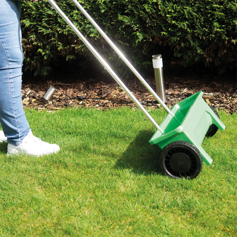 Home and Garden Manual Seed Spreader in use