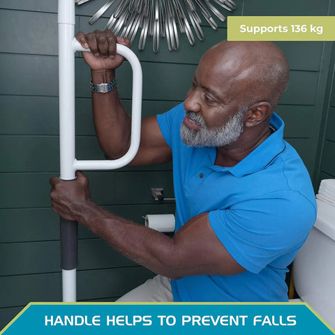 A man is seen in a bathroom. He holds the ergonomic handle of the Universal Grab Rail for support