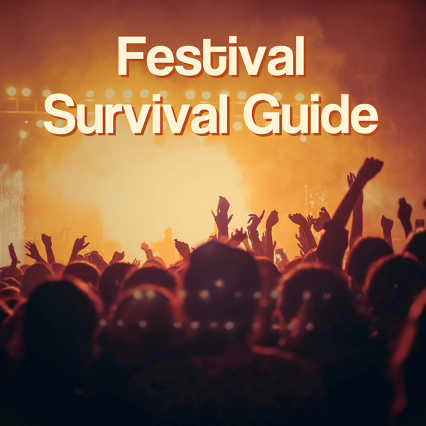 A large crowd of people facing a stage emitting a warm, orange glow. Above is text that reads "Festival Survival Guide".