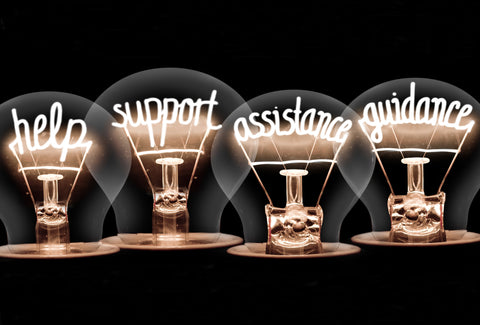 Four lightbulbs with the filaments changed to words – help, support, advice and guidance