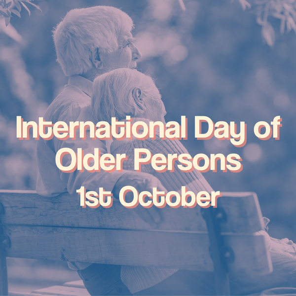 A background of an elderly couple sat on a bench with the text "International Day of Older Persons - 1st October" is in the centre