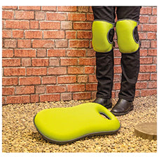 Memory foam kneeler and knee pads on person