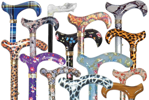 Lots of bright, colourful and patterned handles from many walking sticks