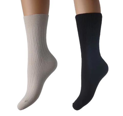 One beige and one black sock – part of the range of oedema socks sold by Ability Superstore 