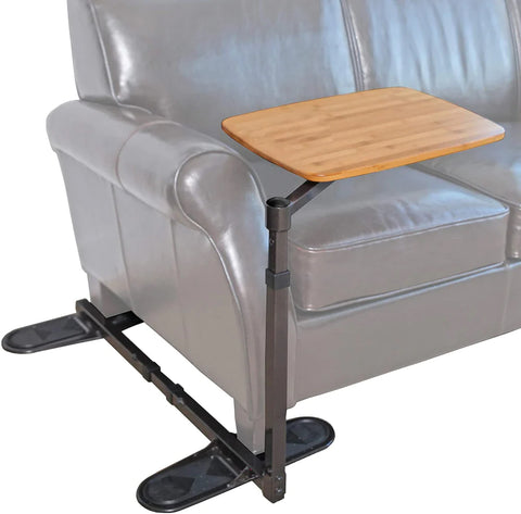 The Able Life Swivel Tray Table by the side of a grey sofa