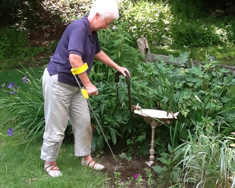 Veronica using a Easi-Grip Long Reach garden tool in her garden