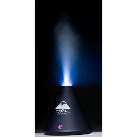 Lifemax volcano humidifier from Ability Superstore misting a dark room with LED lights