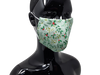 the image shows the christmas mistletoe face mask