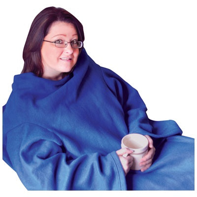 In this photo, a woman is wearing the blue sleeved fleece blanket. She is drinking a hot drink and looks very cosy and warm.