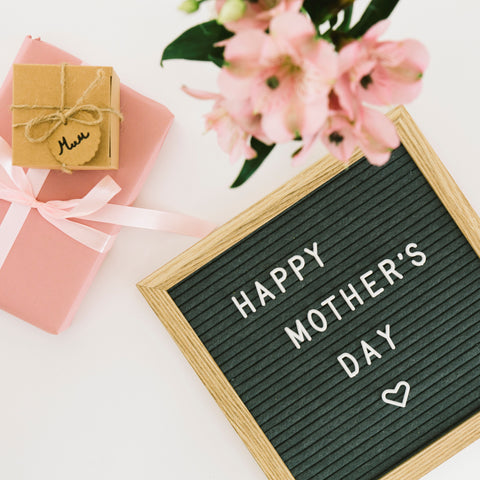 Happy Mother's Day message with flowers and gift