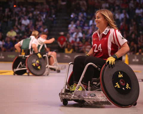 A wheelchair rugby player at the invictus games, in their wheelchair