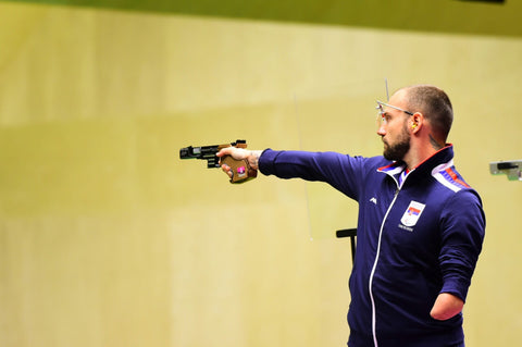 Paralympic Athlete firing a handgun