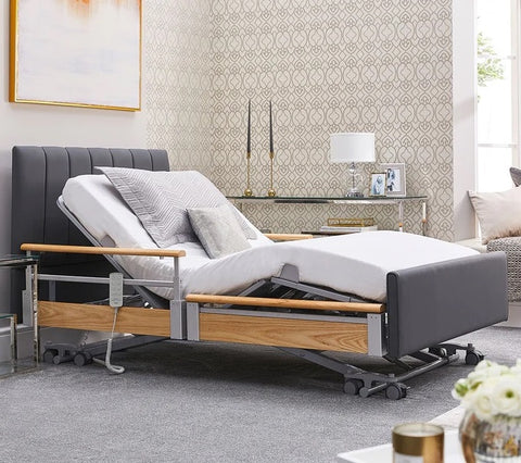 This is a photo of the Opera Solo Comfort Plus Profiling bed with the mattress platform raised. It has the back rest raised up.