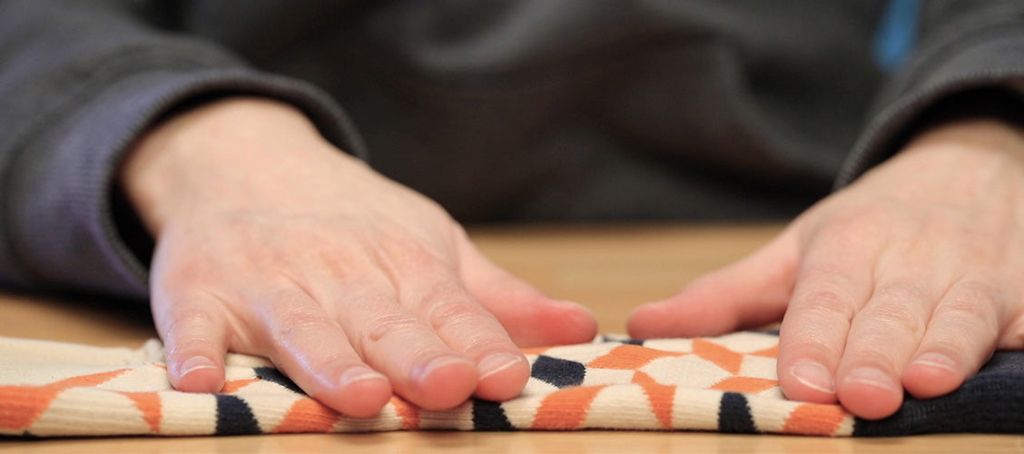 Socks laid out on table with no visible snag on the outside