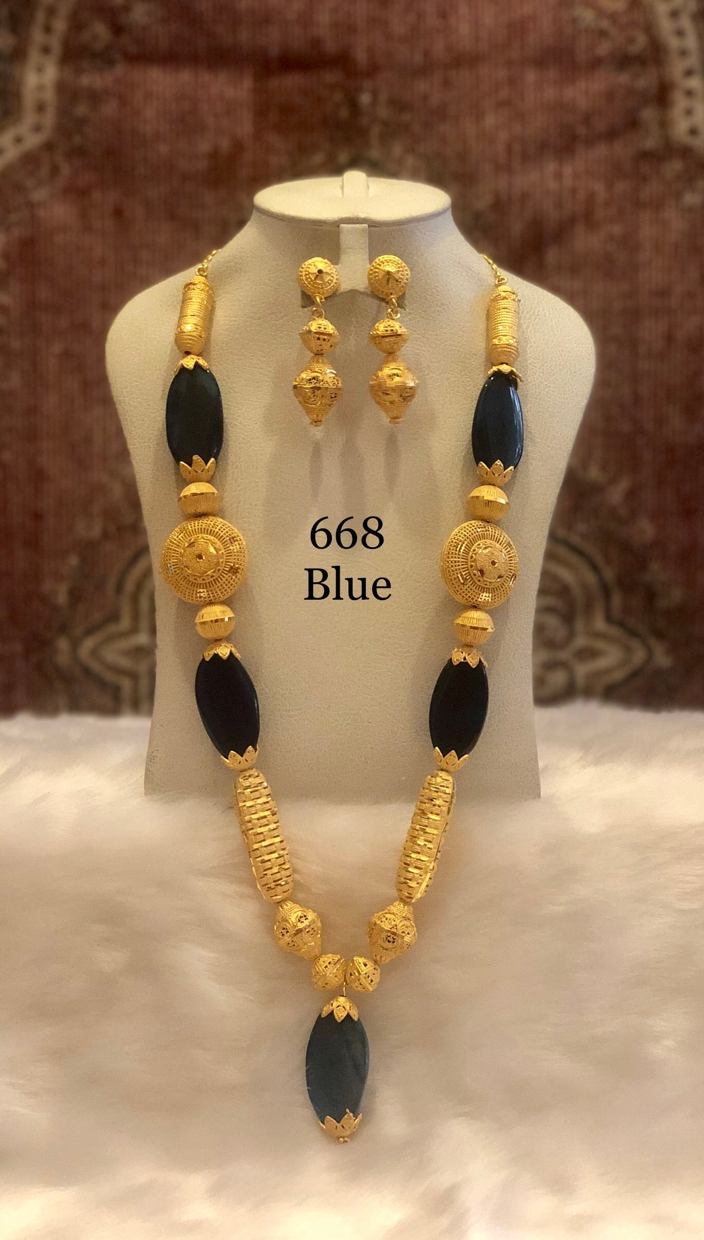 blue stone with gold