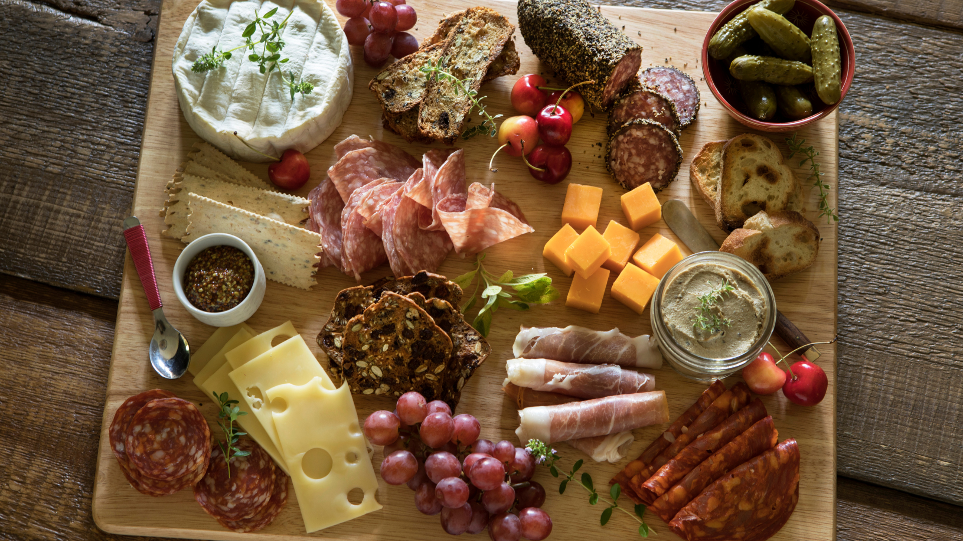 adding homemade cheese as one of healthy charcuterie board ideas 