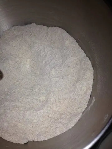 Mixed flour, salt, and baking soda in a bowl