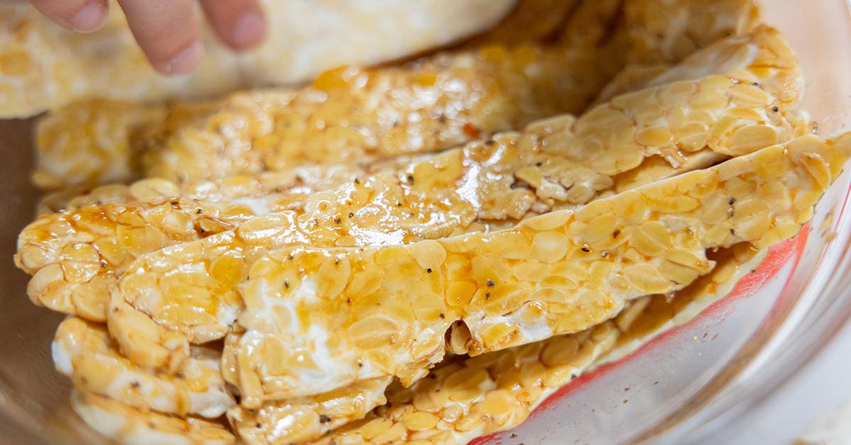 tempeh bacon being marinated