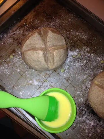 round bread and egg wash