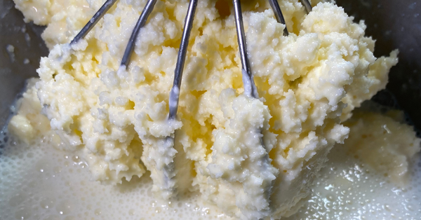 Cultured butter pieces begin to form.