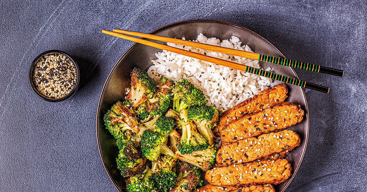 stirfry with tempeh and broccoli and chopsticks