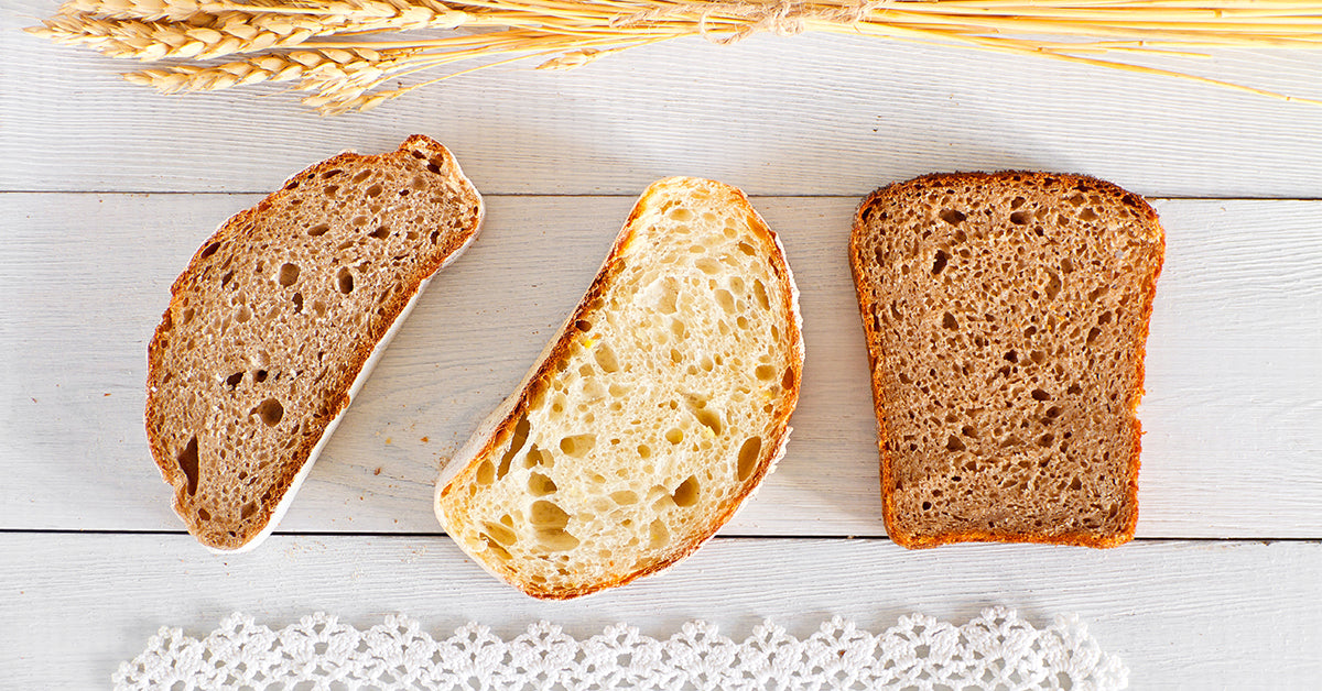 variety of breads setting on a table