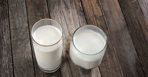 Almond Milk and Dairy Milk in Glasses