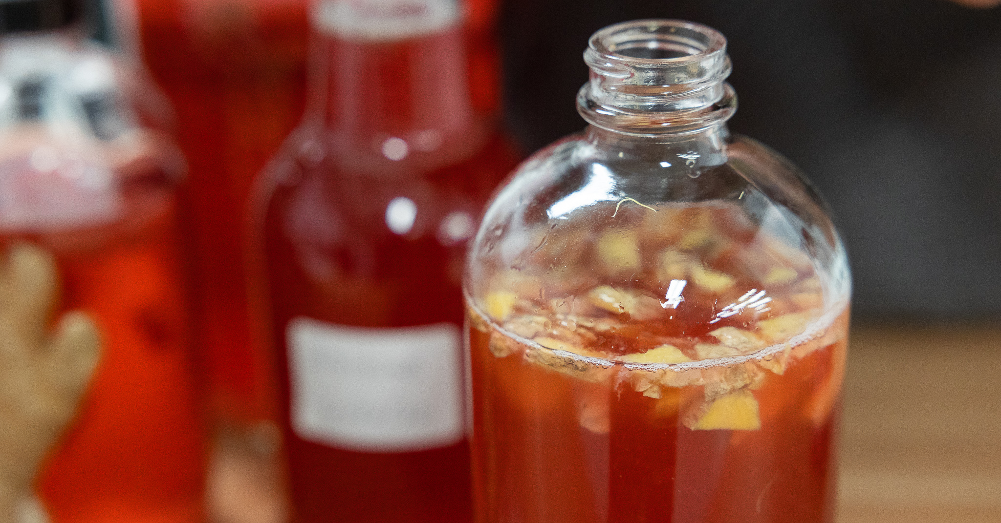 hibiscus kombucha bottle with ginger