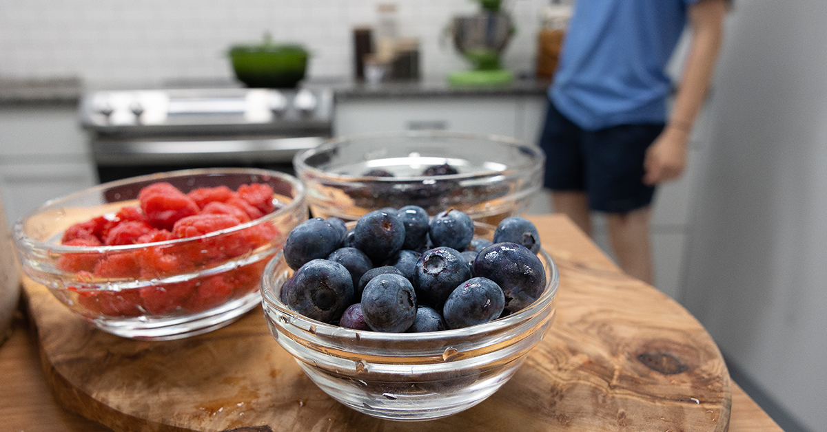 blueberries and raspberries in bowls