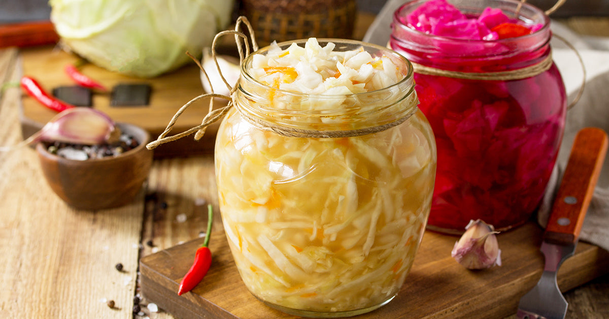 jars of fermented sauerkraut and beets