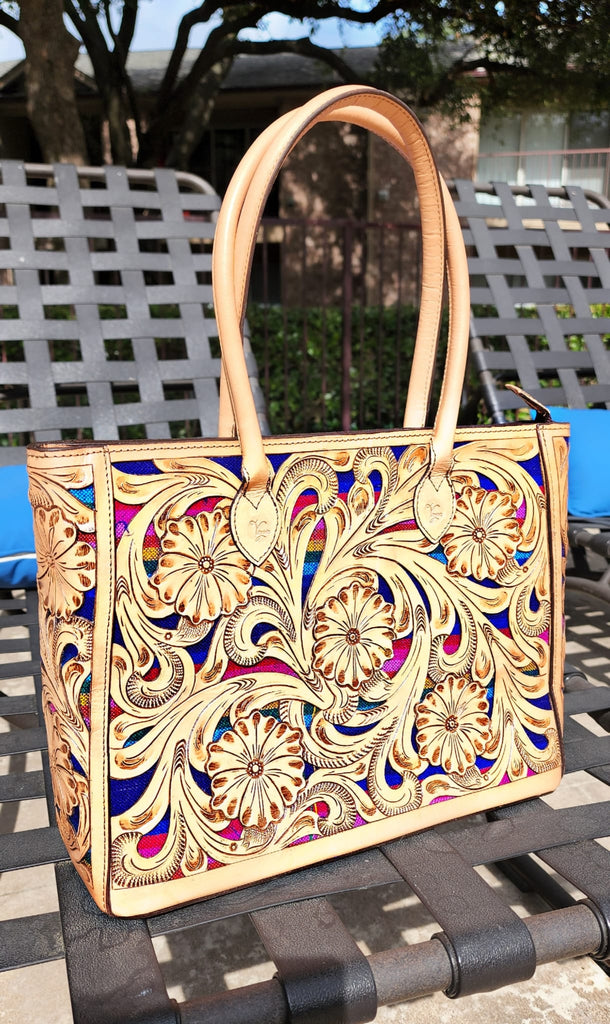 Purchase Wholesale tooled leather makeup bag. Free Returns & Net 60 Terms  on Faire