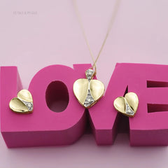 the word "love" with heart jewellery on top