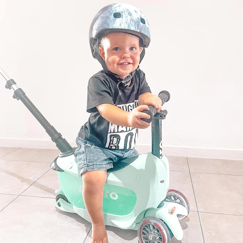 micro ambassador kylee and her toddler on a Mini2Go ride on scooter in mint