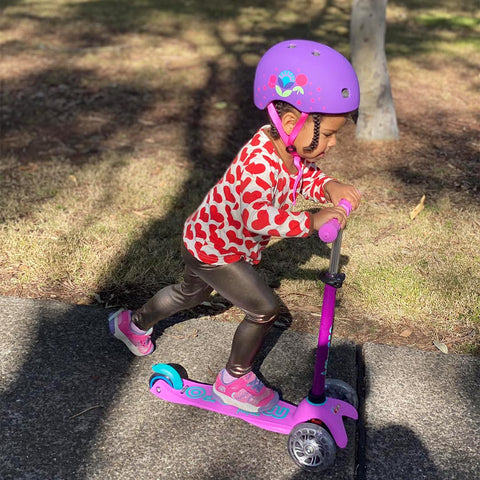 micro ambassador julie's daughter willow on her lavender 3 wheel scooter