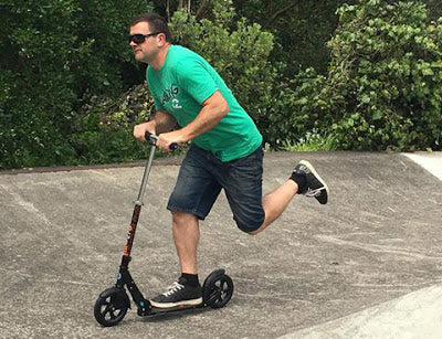 New Zealand mayor Tim Shadbolt scooting