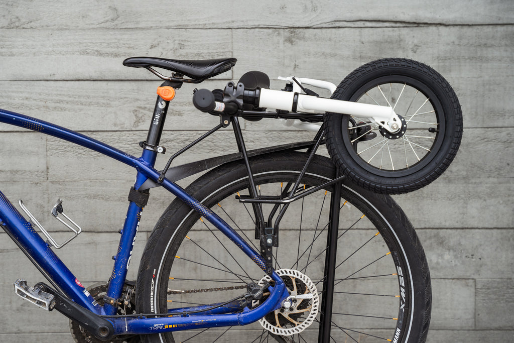 Balance bike on a bike rack