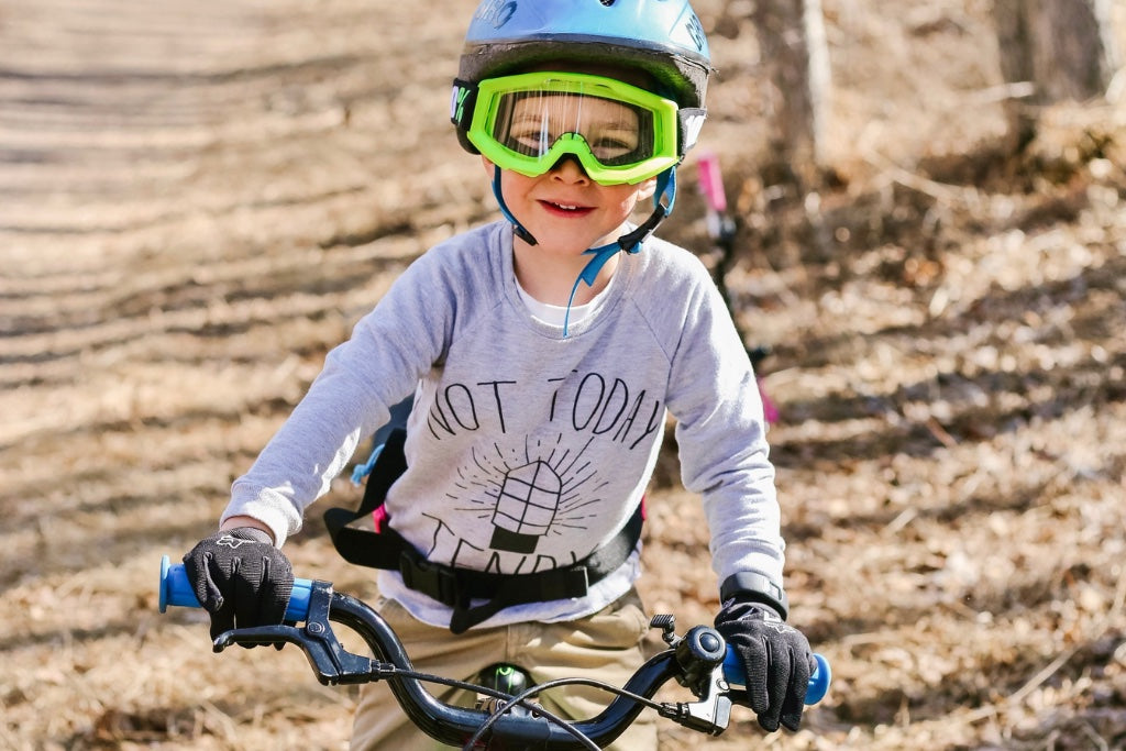 Kid wearing mountain bike gloves