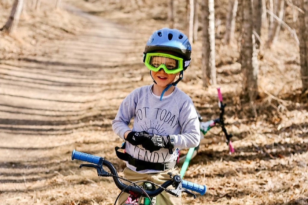 Mountain bike kid wearing cycling gloves 