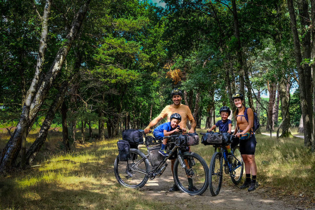 Mountain biking family on a bikepacking adventure