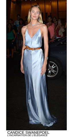 Candice Swanepoel in belted satin dress