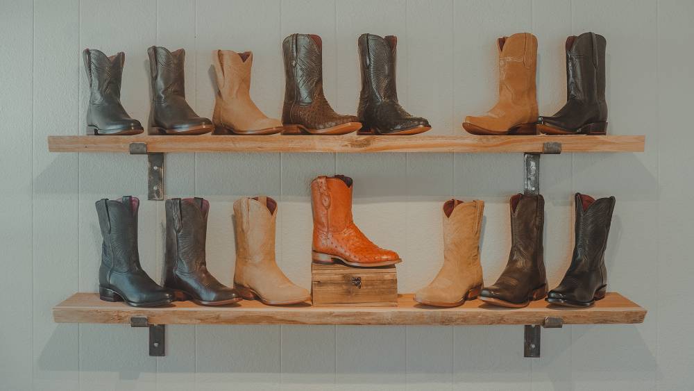 complete line up of Chisos cowboy boots in their store in Austin Texas