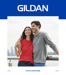 A smiling woman in red and man in gray, arm in arm, with: GILDAN STYLE & COLOR GUIDE 2021, text above, against a city skyline backdrop.