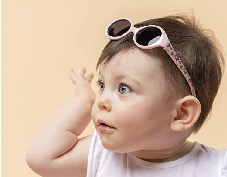 baaby wearing baby flower sunglasses