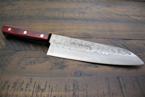 Santoku knife on wood table