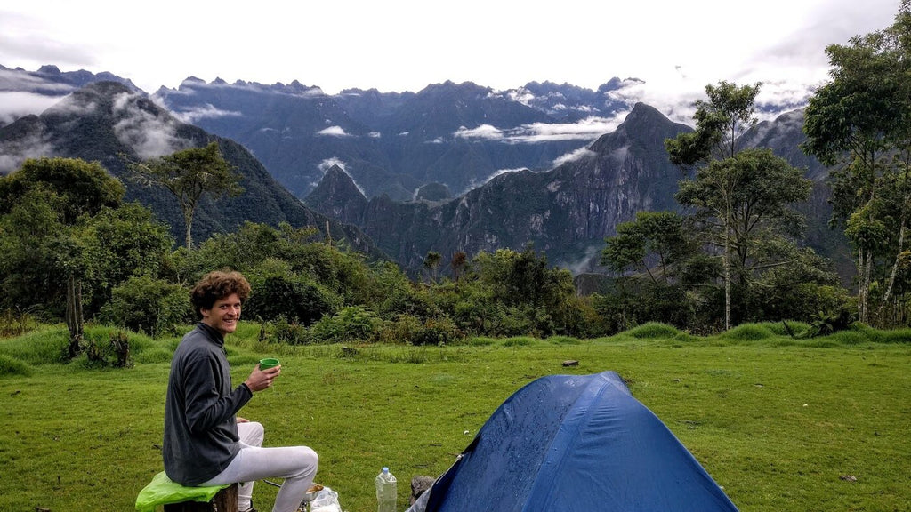 Preparing cacao with a view on Machu Picchu