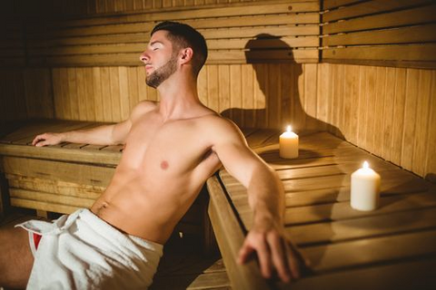 a man taking a sauna bath