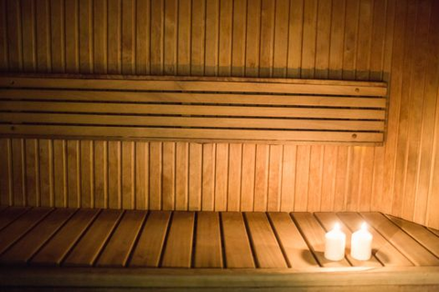 a sauna with candles