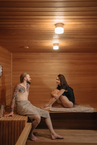 a couple inside a sauna