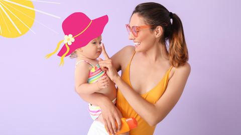 Child being applied on sunscreen and wearing a sun hat as protection from sunburn, illustrating practical steps for sunburn prevention in kids during summer